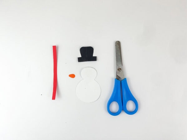 Cut-out snowman pieces for snow globe craft