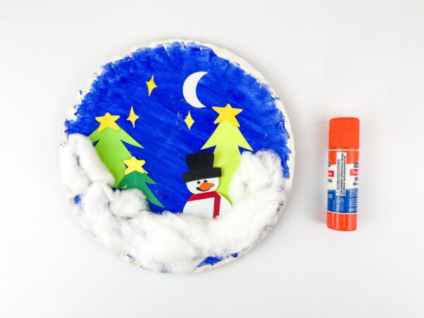 Snow globe paper plate with snowman added