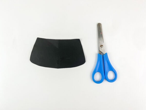 Black paper base cut out with scissors