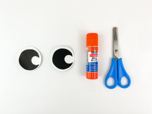 Cut-out reindeer eyes with glue stick and scissors
