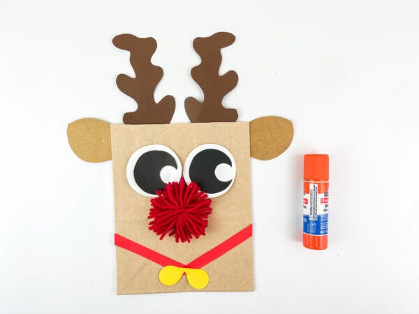 Reindeer paper bag with yarn nose glued on