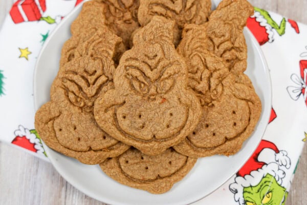 Plate of baked Grinch gingerbread cookies