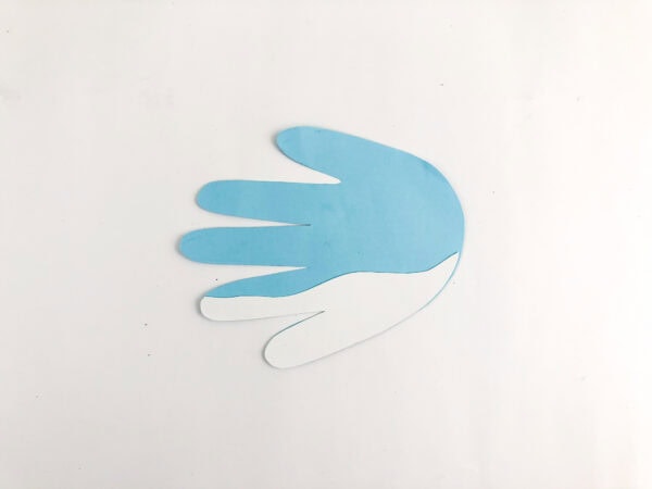 Blue handprint body assembled with white underside piece.