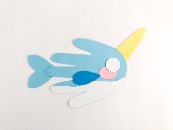 Narwhal with added fin, tail, and pink cheek.