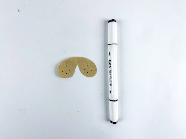 Snout piece with dots drawn on it.