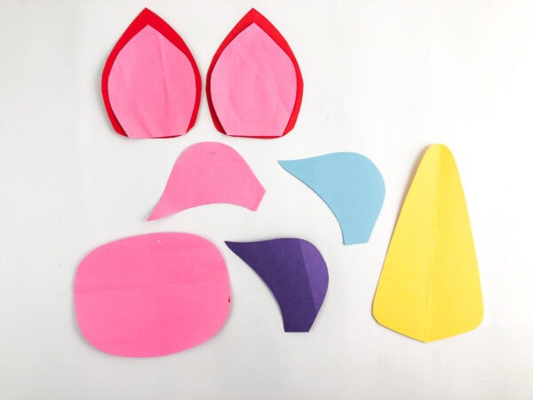 Assembled unicorn ear, mane, snout, and horn pieces.