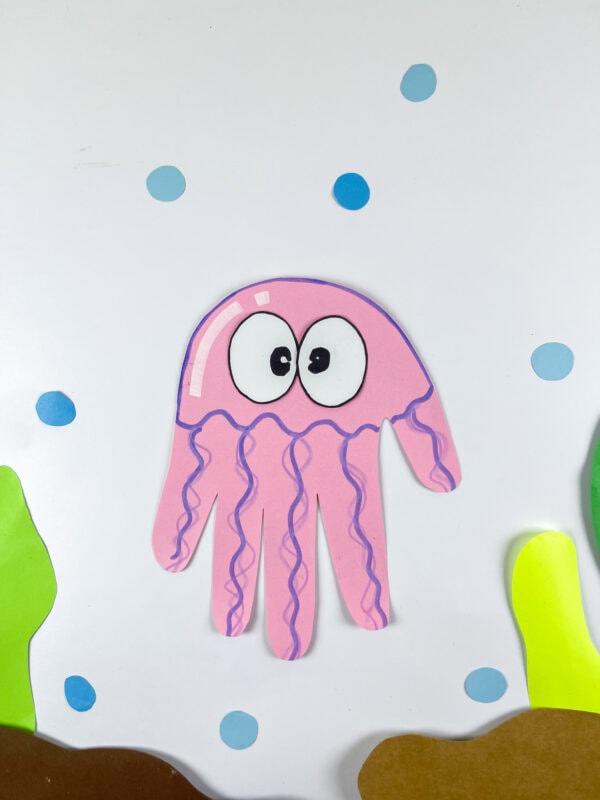 Jellyfish handprint craft with sea plants and bubble decorations