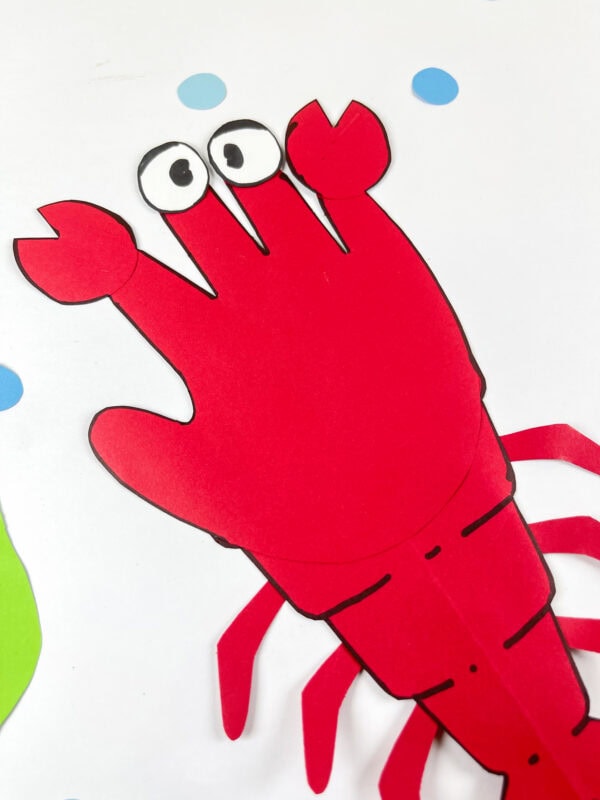 Close-up of lobster handprint face and claws