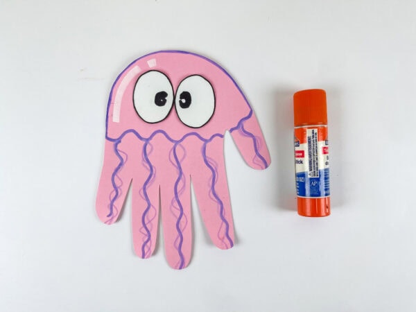 Jellyfish handprint craft with glued-on eyes