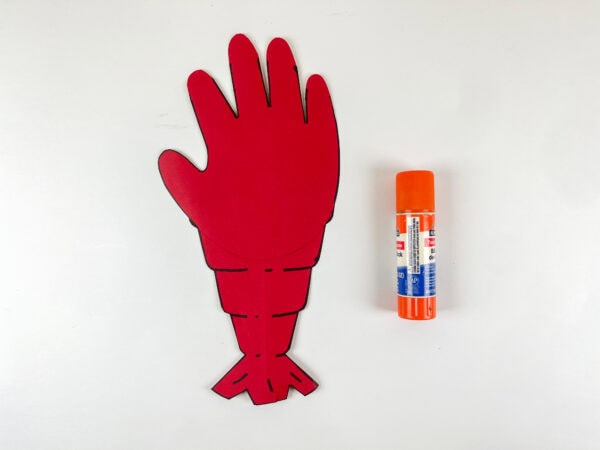 Red handprint lobster body glued together