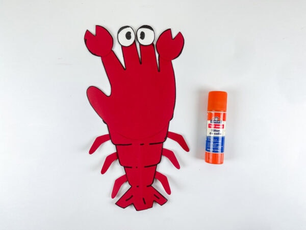 Lobster handprint craft with legs glued on