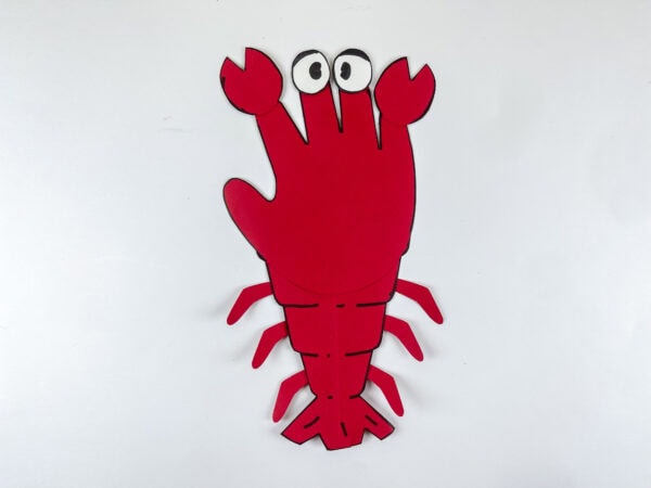 Completed lobster handprint paper craft on white background