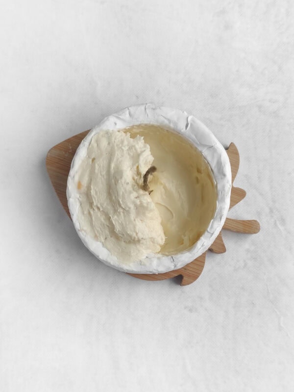 Whipped cheese mixture spread inside a brie rind.