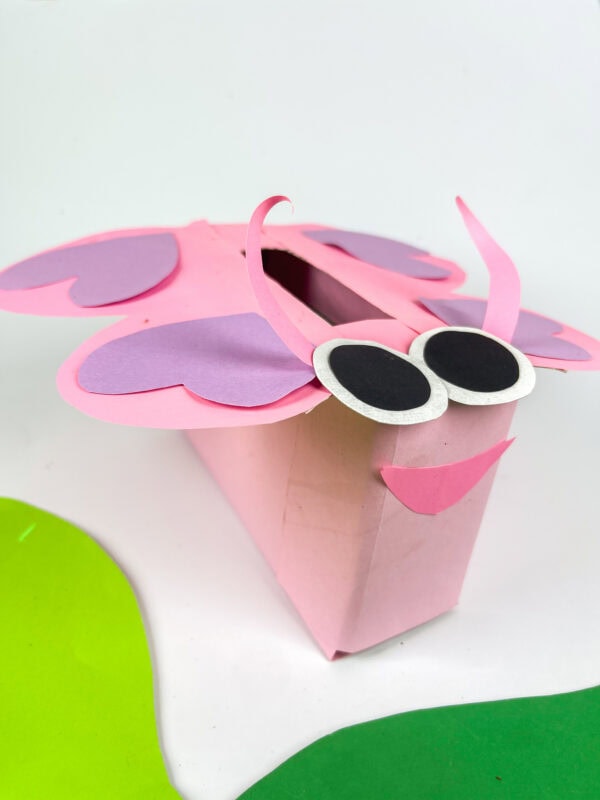 Close-up of butterfly Valentine box with eyes and wings