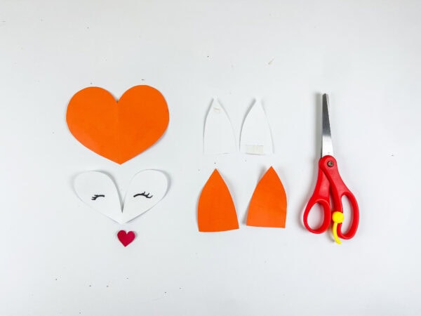Paper fox face and ear pieces with scissors