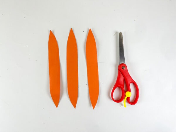 Orange paper strips cut for box decoration