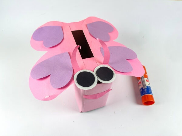 Butterfly Valentine box with eyes and glue stick