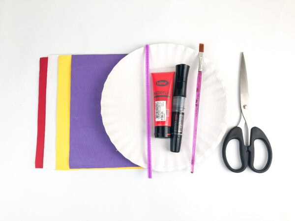 Paper plate craft supplies with scissors and paint