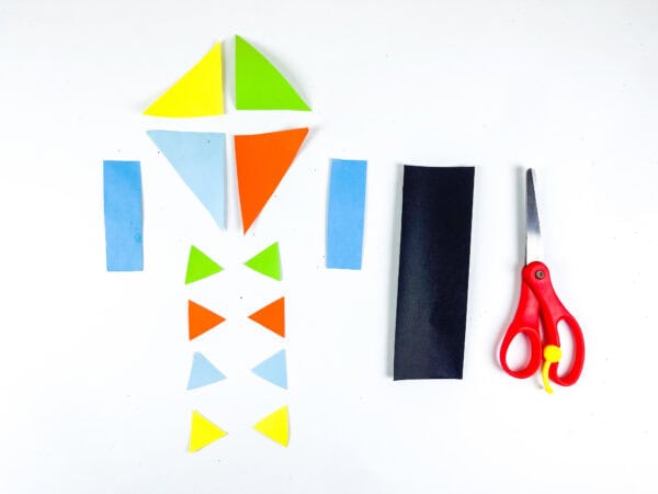 Kite pieces cut from colored paper