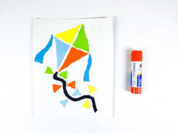 Kite craft on card with glue stick