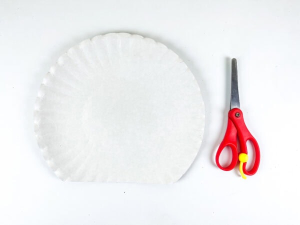 Paper plate half with scissors