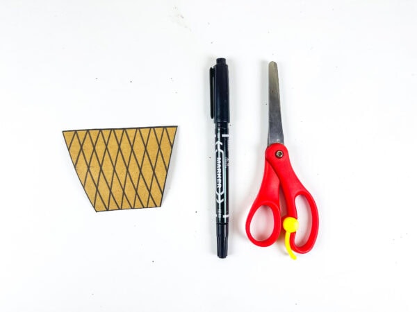 Paper basket cutout with marker and scissors