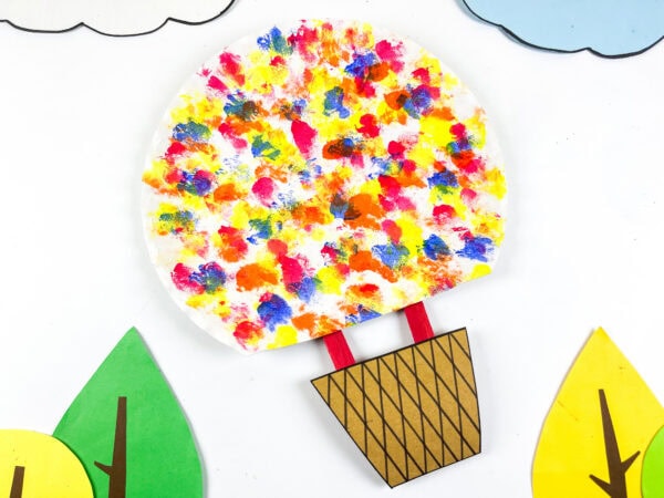 Balloon craft displayed with paper scenery