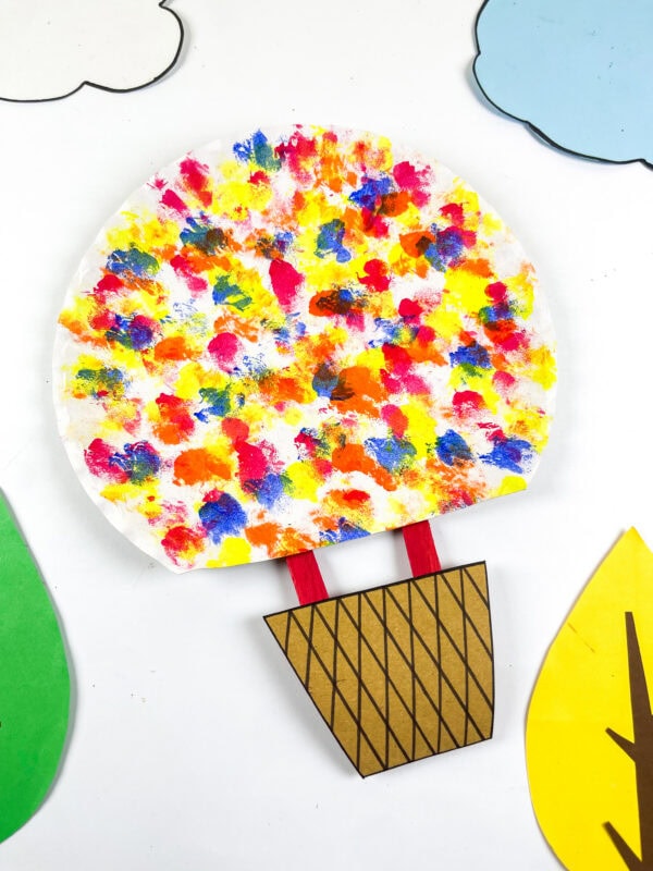 Balloon craft with basket on background