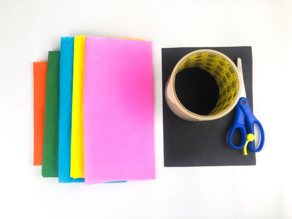 Colored tissue sheets, tape roll, and scissors