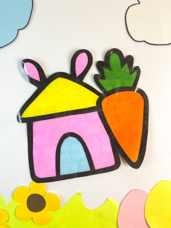 Bunny house suncatcher on window background