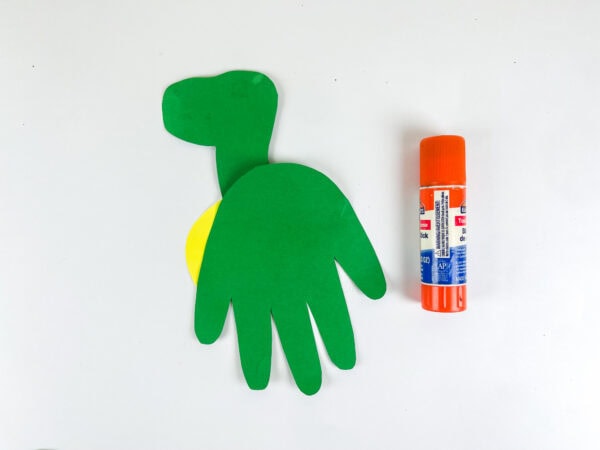 Handprint body glued with head and belly piece