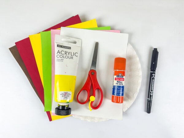 Paper plate craft supplies with paint and scissors