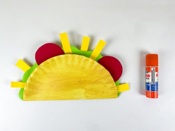 Taco shell with toppings glued on