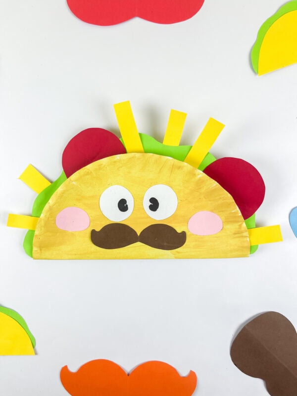 Taco paper plate craft with toppings background