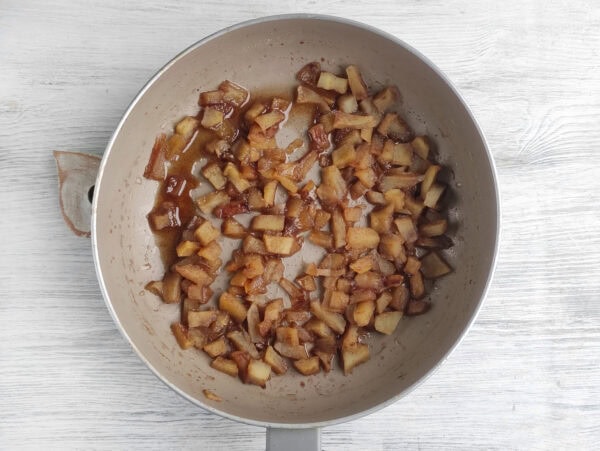 Diced apples cooking in a pan

