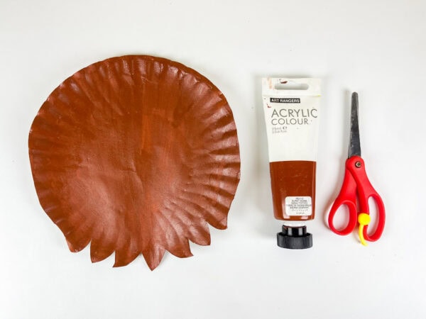 Paper plate painted brown for Chewbacca base