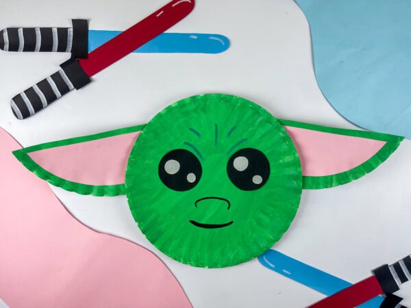 Baby Yoda paper plate craft on colorful background