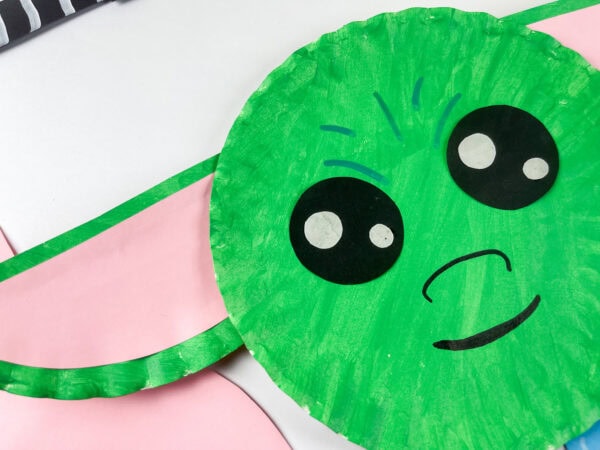 Close-up of Baby Yoda paper plate craft face