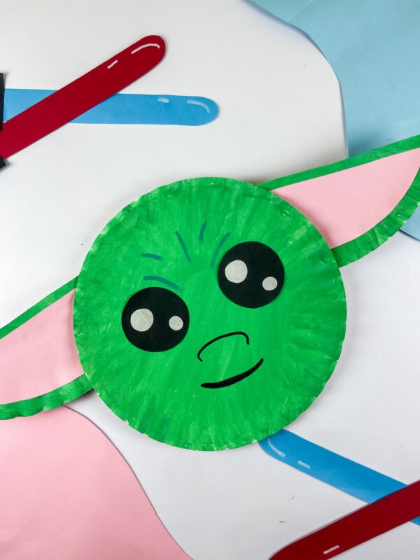Angled view of Baby Yoda paper plate craft