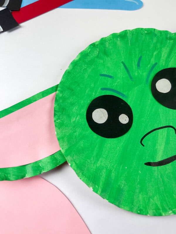 Close-up of Baby Yoda paper plate craft face