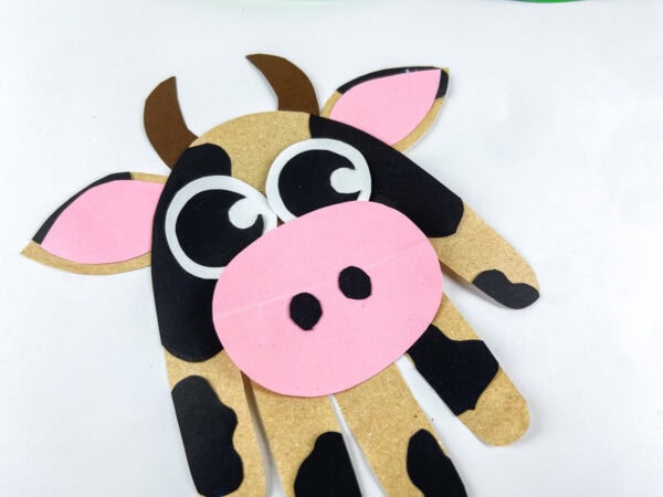 Close up of cow handprint craft face details