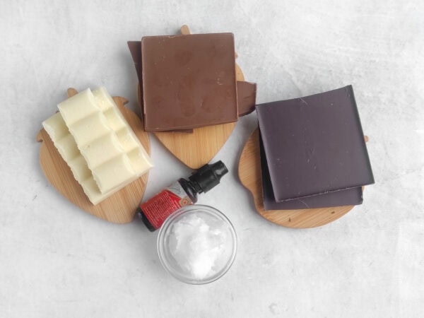 White, milk, and dark chocolate blocks with coconut oil and flavoring