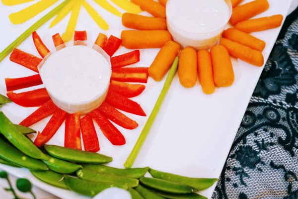 Vegetable flower tray with snap pea stems