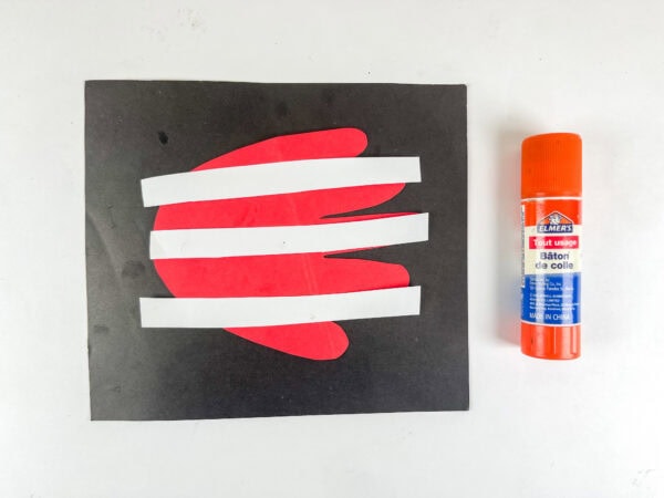 Handprint with white flag stripes