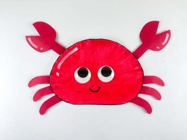 Smiling paper plate crab craft close-up
