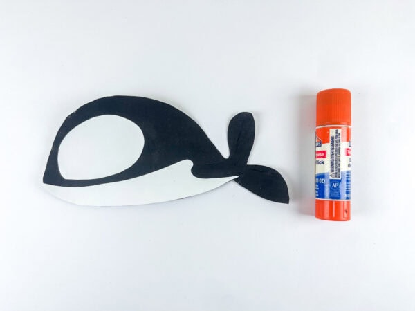 Gluing orca whale craft pieces