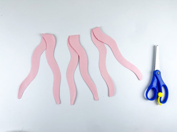Pink jellyfish tentacles cut from paper