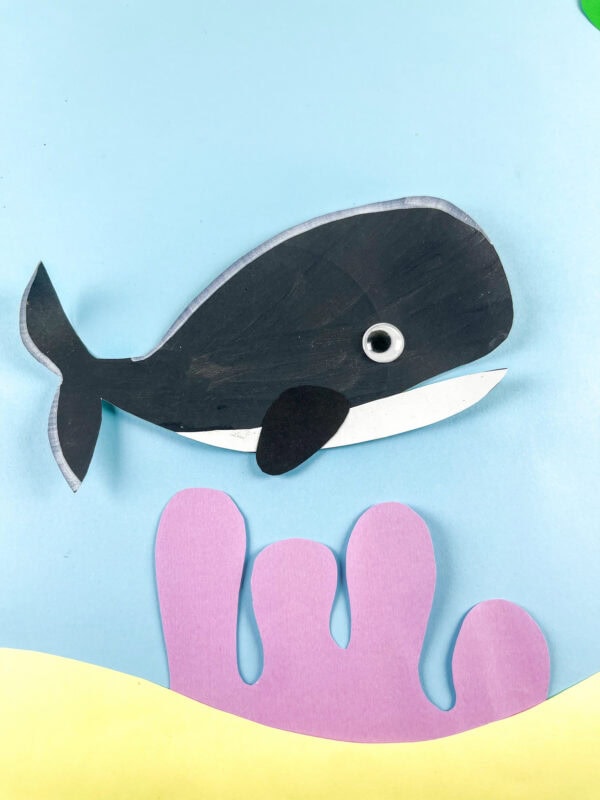 Orca whale craft on blue background