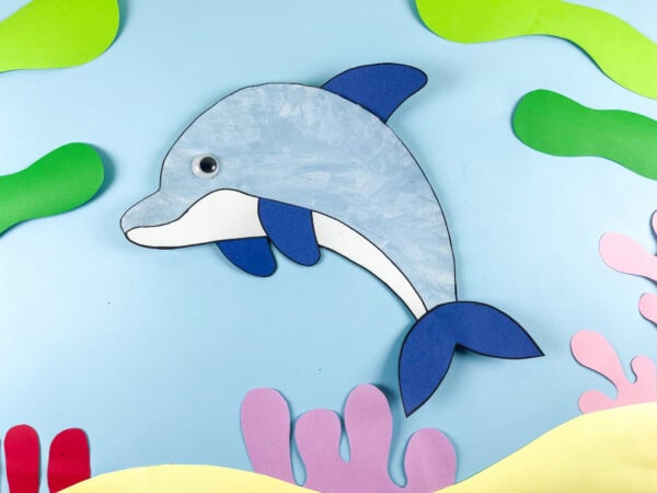 Dolphin craft displayed on ocean scene background