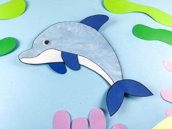Close up of paper plate dolphin craft